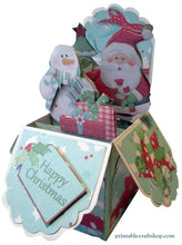 Load image into Gallery viewer, A festive pop-up box card with Santa, a snowman, and presents